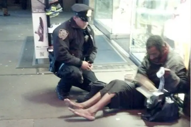 Officer Lawrence DePrimo's act of kindness went viral on the Internet and on television around the world. Now the homeless man who received the boots wants his "piece."